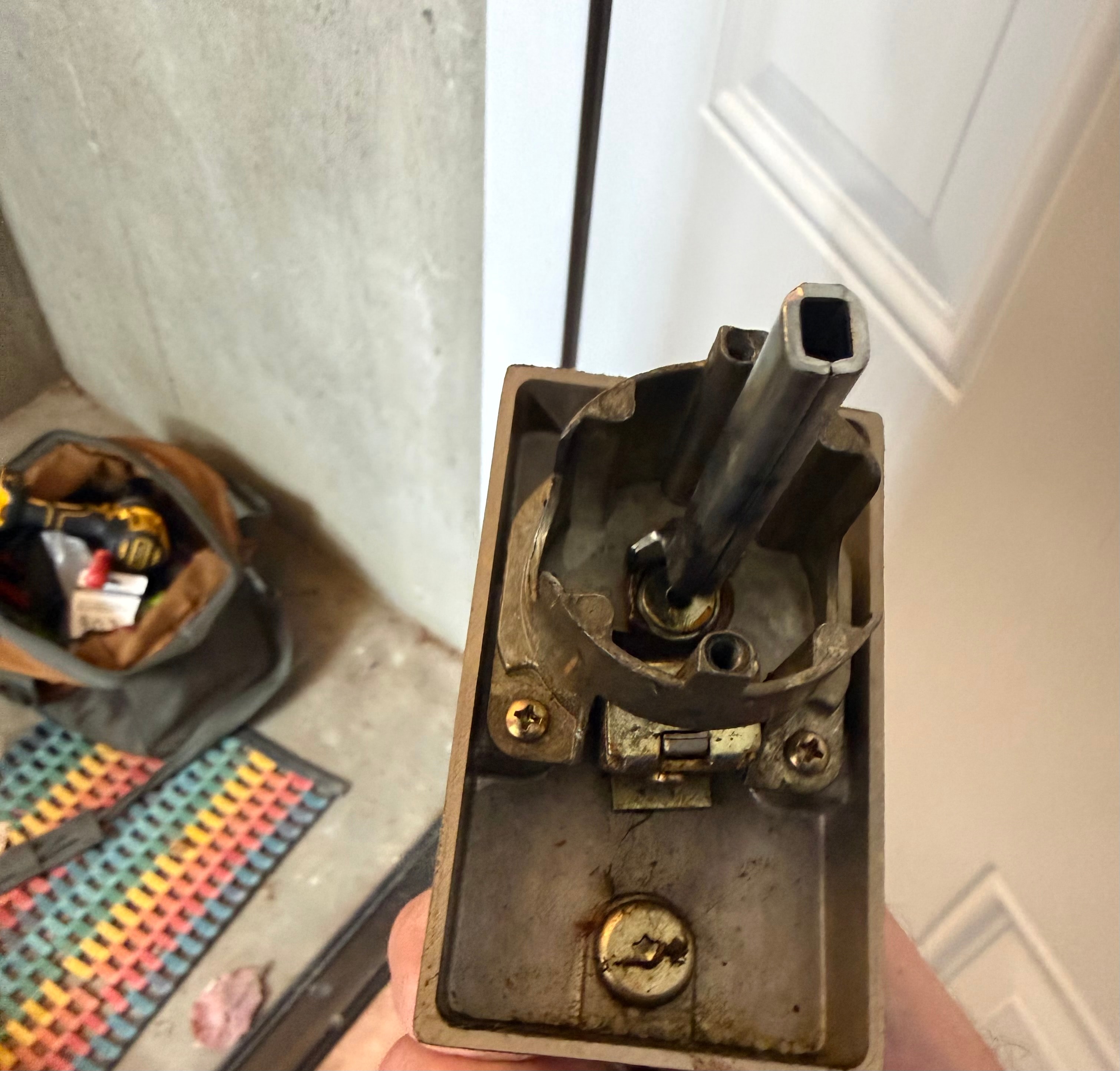 Emtek handleset thumbpress mechanism disassembled for repair — residential locksmith service in Vancouver WA