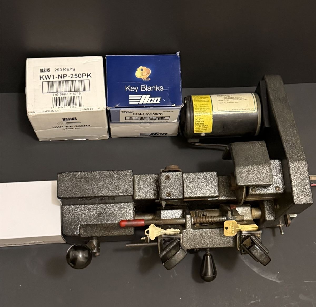 Locksmith copying a Schlage key onto a Do Not Duplicate blank — residential key duplication Vancouver WA