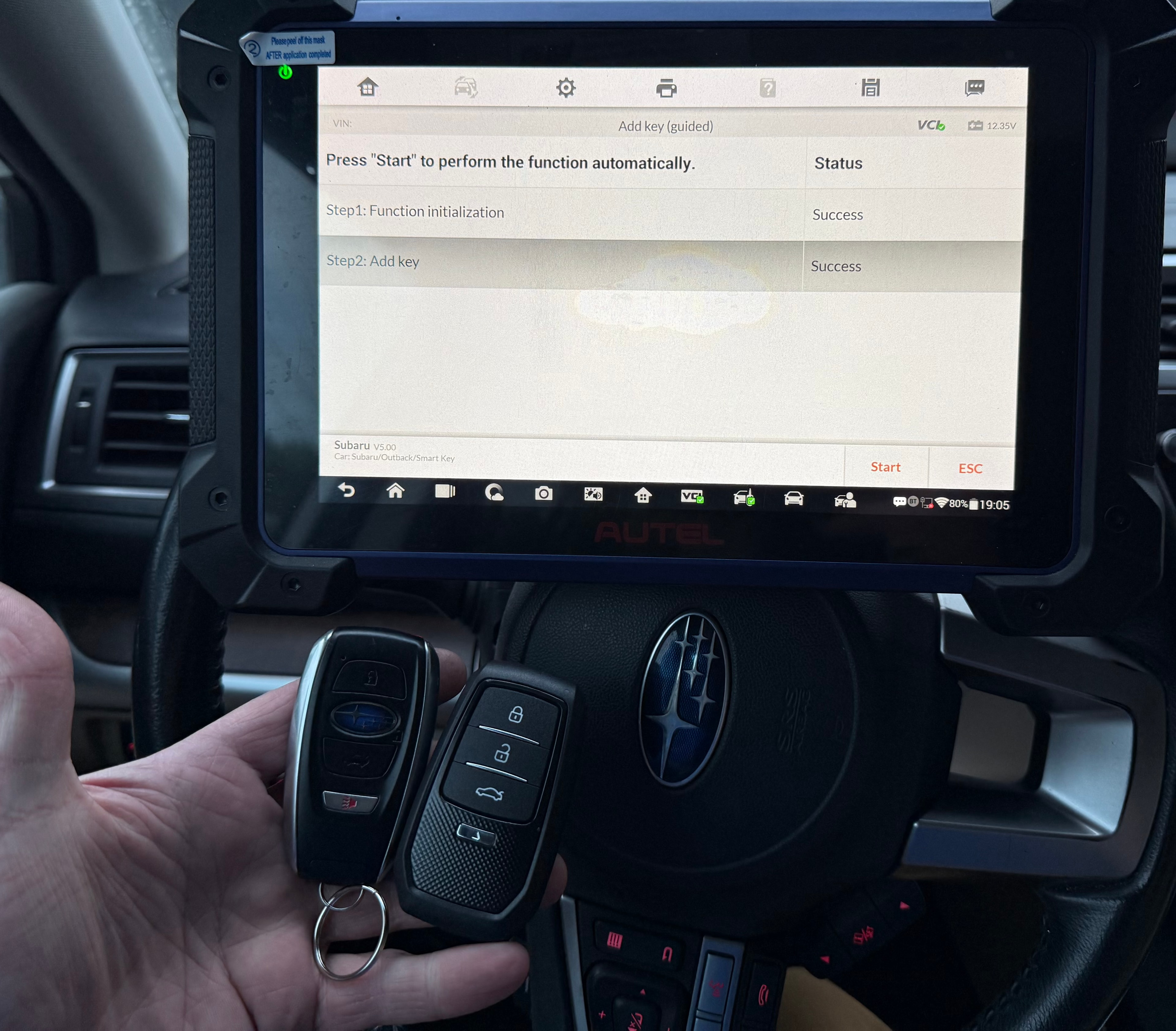 Automotive locksmith programming new smart keys for a Subaru Outback — Orion's Key Vancouver WA